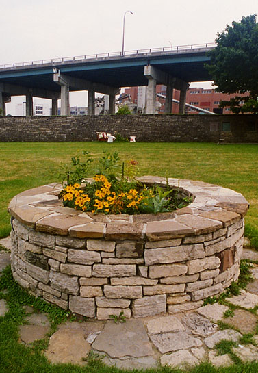 Captured & Escaped, 1995, detail (native wildflowers, well)