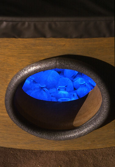 Like Ancient Pots spilled from a drowning ship, tube sponges bulge eerily …, 1993, detail  (porthole under bench with view to spilled&nbsp;pots, mixed media)