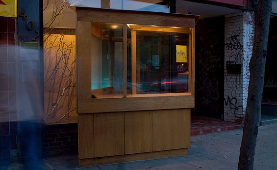 Vagabond Vitrine, 2010, streetscape at dusk